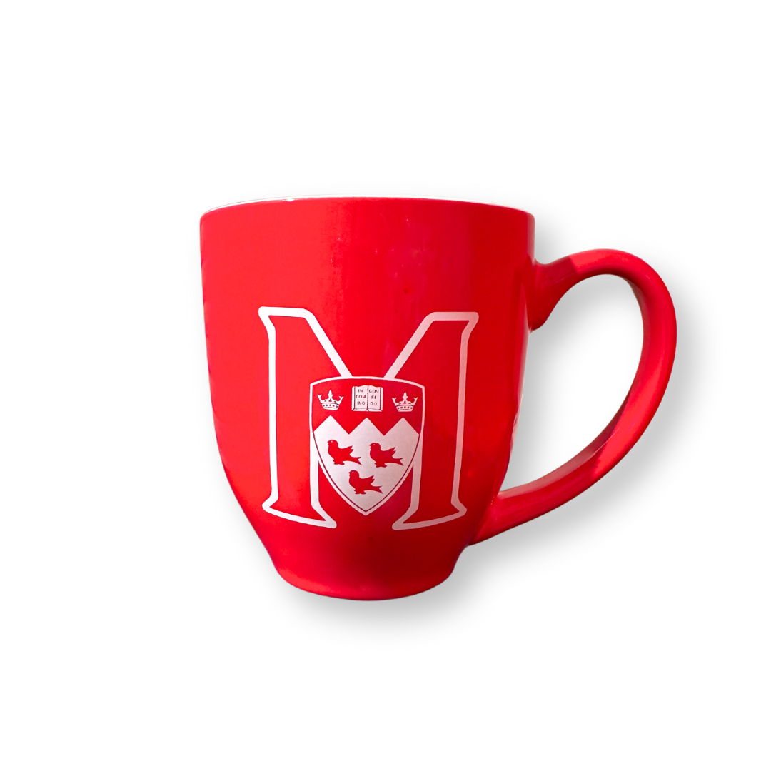 Take a sip and show your support for all things McGill Athletics! This large ceramic mug holds 16oz and has a red exterior with white interior. Features the McGill Athletics logo on the front and back. Dishwasher and microwave safe