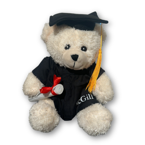 9" Grad Bear carrying a detachable diploma and dressed in a cap and gown featuring a golden tassel and “McGill” imprinted on the robe.