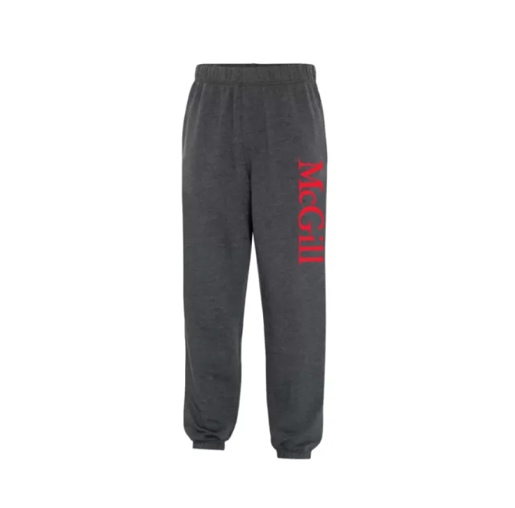 Grey jogger pants with elastic waistband and cuffs, featuring red vertical McGill logo on the left leg.