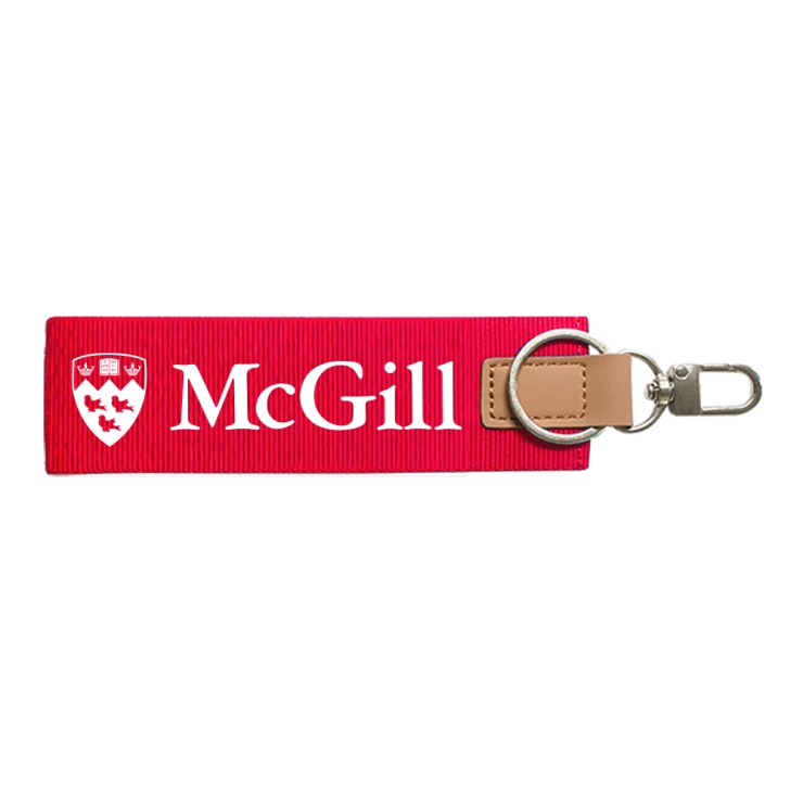 Red McGill keychain wristlet with white logo, leather loop, metal key ring and clip.