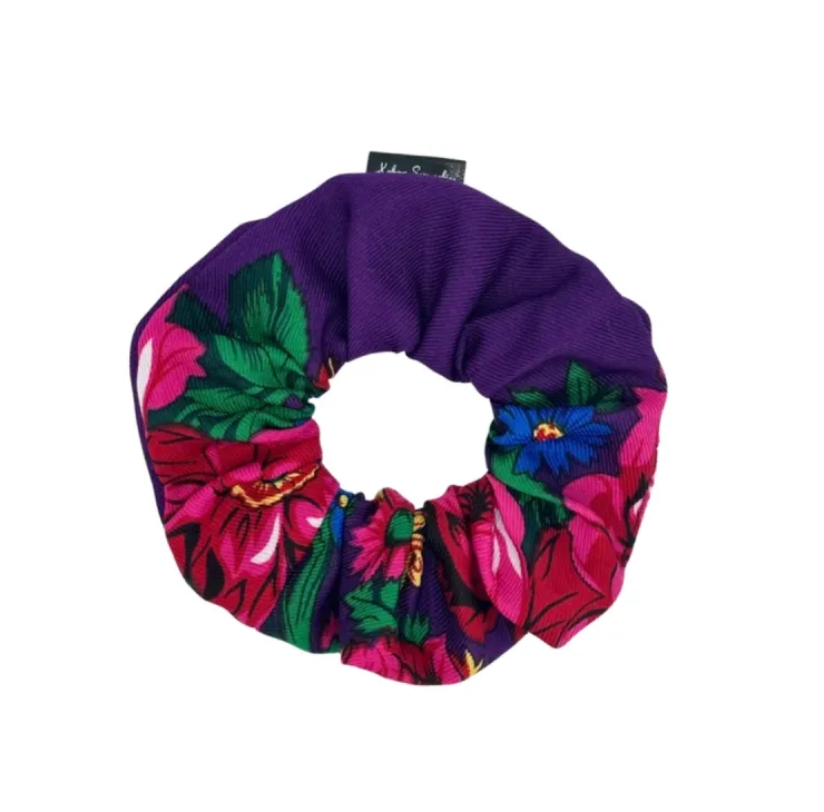 Purple floral scrunchie with vibrant pink and red flowers with green leaves, designed by Kokom Scrunchies.
