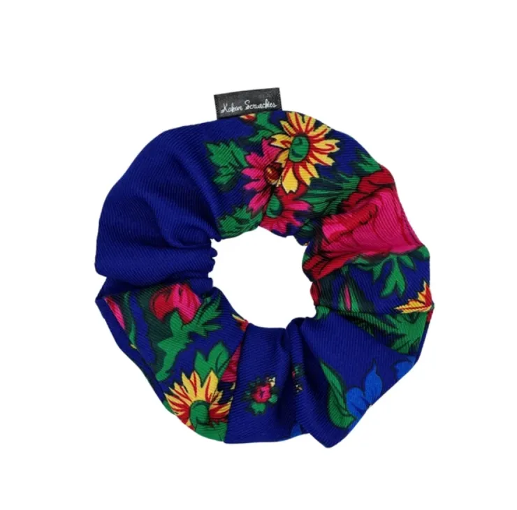 Royal Blue floral scrunchie with vibrant pink and yellow flowers and green leaves, designed by Kokom Scrunchies.