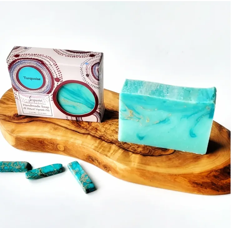 Sequoia Tuquoise handmade soap bar with natural oils, displayed with illustrated packaging and turquoise stones