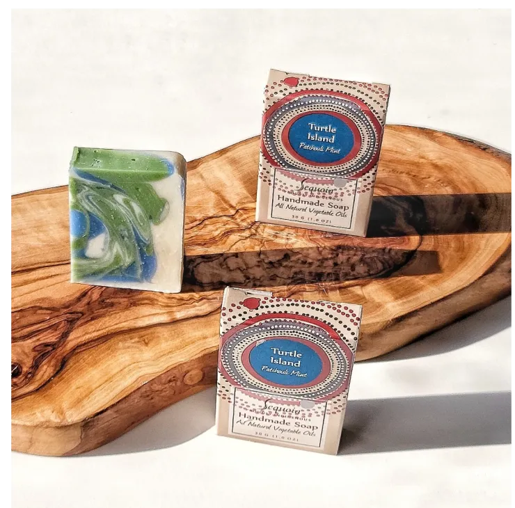 Sequoia Turtle Island handmade soap bar with natural oils, displayed beside decorative product packaging.