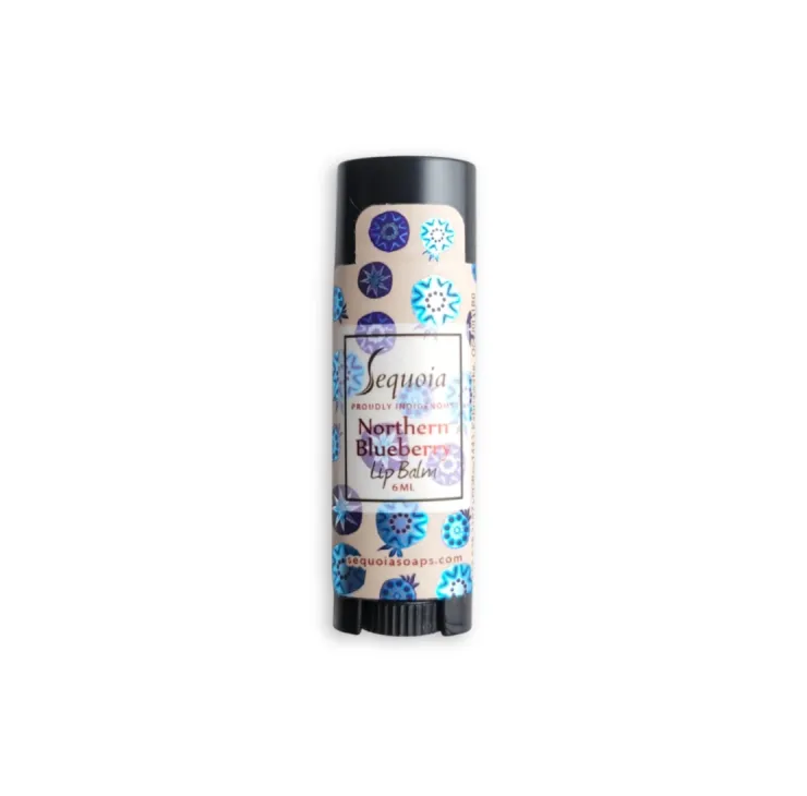 Sequoia Northern Blueberry lip balm in twist-up tube with blue berry-inspired pattern and botanical label.