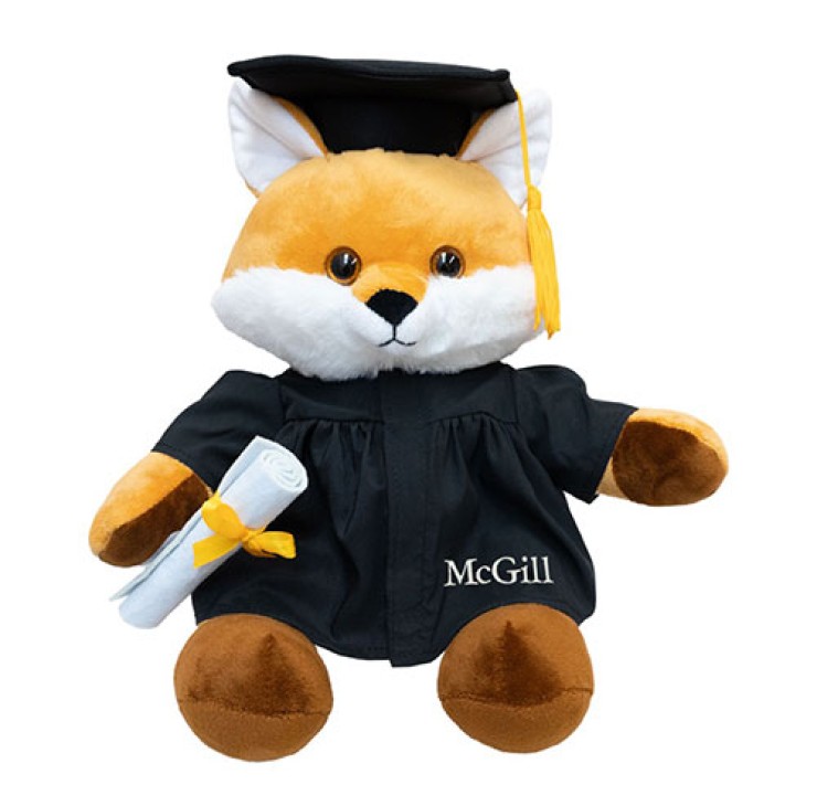 A 12" Fox Grad Plush carrying a diploma and wearing a grad cap and embroidered McGill gown.