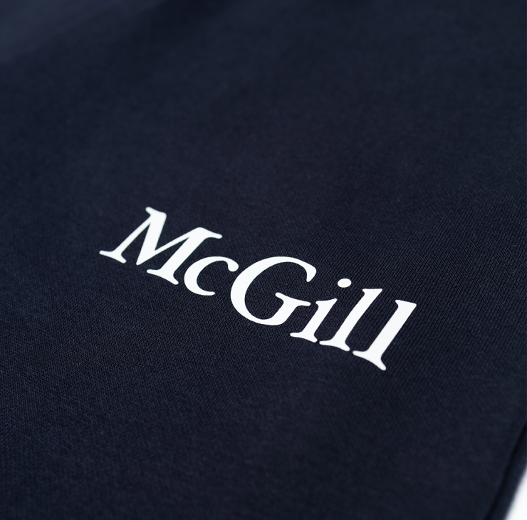 UNISEX - Comfortable and relaxed, these fleece joggers offer a tapered fit that's roomy through the thighs and hips and gradually narrowing towards the ankles for a modern, athletic silhouette. With side pockets and ribbed cuffs and waistband, they feature the McGill wordmark done in a white rubber print on the left hip