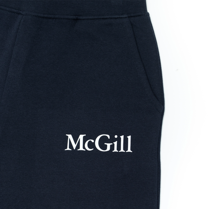 UNISEX - Comfortable and relaxed, these fleece joggers offer a tapered fit that's roomy through the thighs and hips and gradually narrowing towards the ankles for a modern, athletic silhouette. With side pockets and ribbed cuffs and waistband, they feature the McGill wordmark done in a white rubber print on the left hip