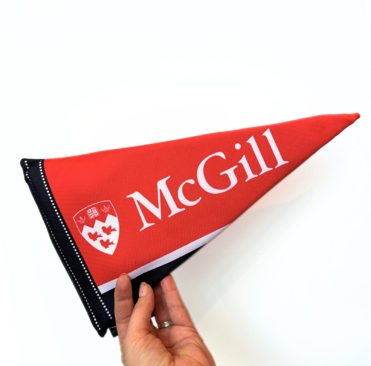 We know that all good boys cheer for McGill! This McGill pennant dog toy features a foam insert and not one but two squeakers to keep your pup busy while you are at class