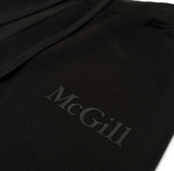  Comfortable and relaxed, these fleece joggers offer a tapered fit that's roomy through the thighs and hips and gradually narrowing towards the ankles for a modern, athletic silhouette. With side pockets and ribbed cuffs and waistband, they feature the McGill wordmark done in a tone-on-tone rubber print on the left hip