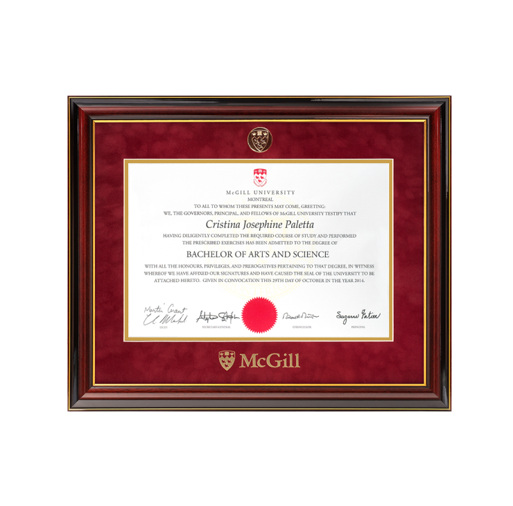 This frame features a gold medallion engraved with the McGill crest inset in the top border of the mat and the McGill logo is hot stamped in gold foil on the bottom. The profile features a classic swan’s neck design and is accented with two gold lines on the inner lip and outer edge of the moulding. The finish turns to a charcoal gray towards the outside edge. It is assembled with a double, acid-free red suede mat. 