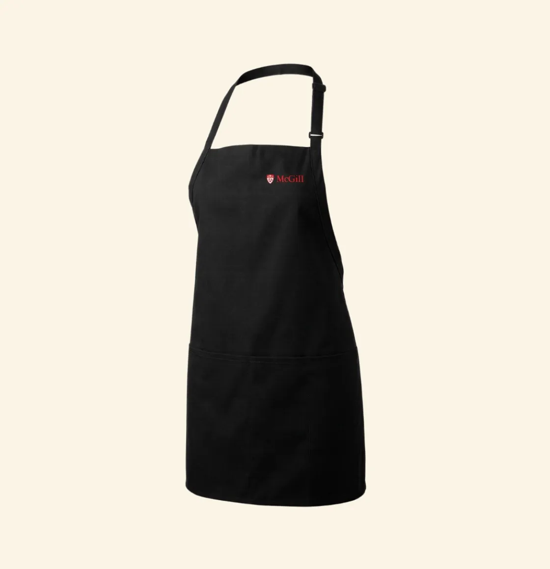 Black adjustable apron with small red McGill logo on the chest