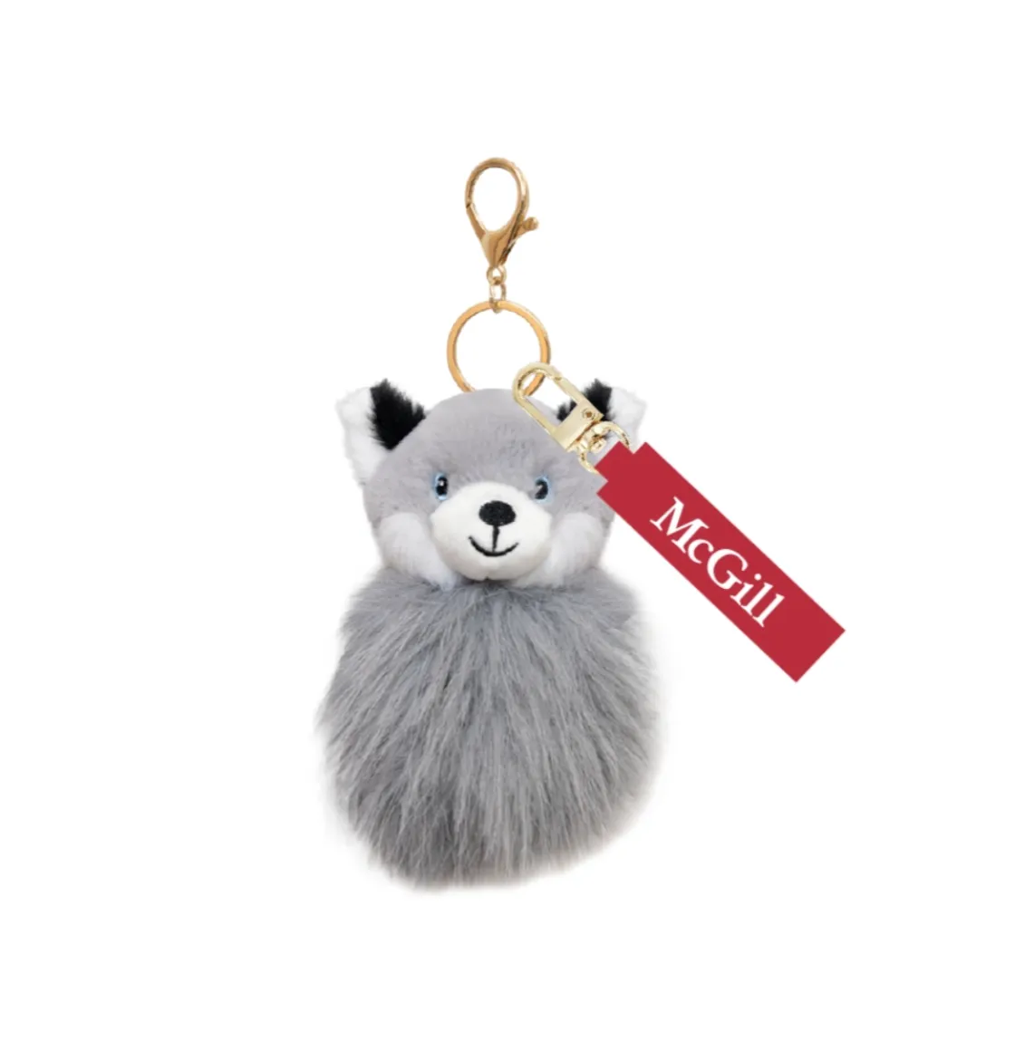 Husky plush keychain with gold clip and ring, featuring red McGill tag and soft faux fur body.