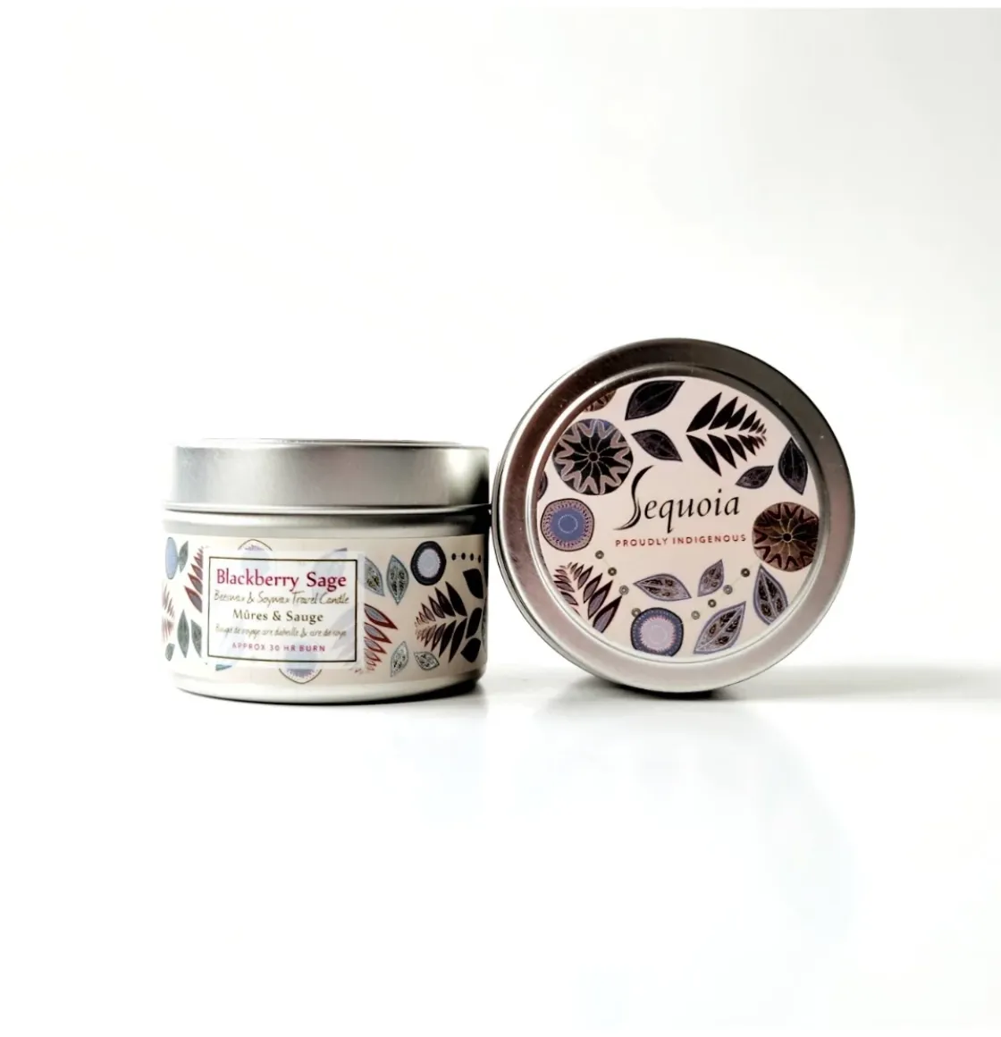 Sequoia Blackberry Sage scented candle in decorative tin with botanical pattern and silver lid.