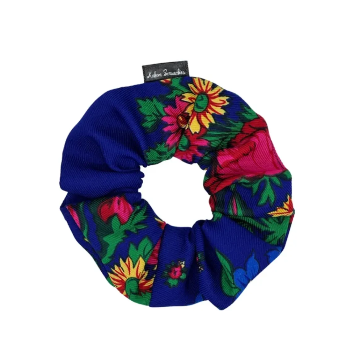 Royal Blue floral scrunchie with vibrant pink and yellow flowers and green leaves, designed by Kokom Scrunchies.