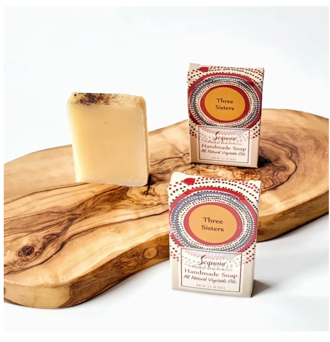 Sequoia Three Sisters handmade soap bar with natural oils, displayed beside decorative product packaging.
