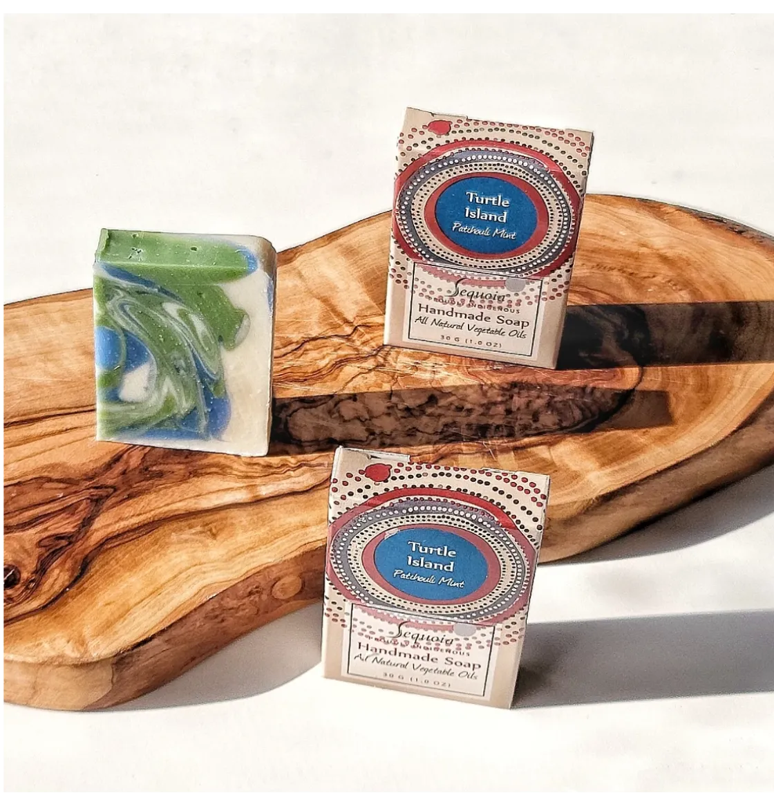 Sequoia Turtle Island handmade soap bar with natural oils, displayed beside decorative product packaging.