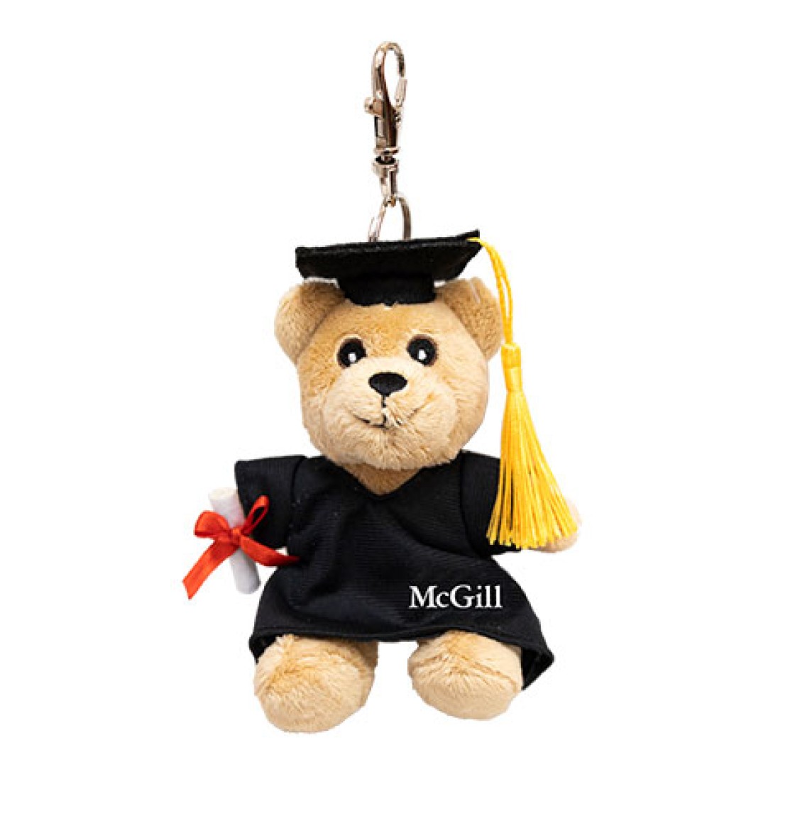 3" plush Grad Bear carrying a detachable diploma and dressed in a cap and gown featuring a golden tassel and “McGill” imprinted on the robe.