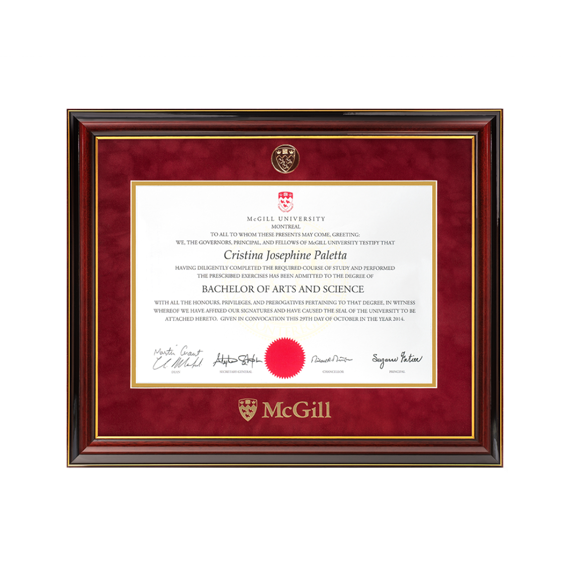 This frame features a gold medallion engraved with the McGill crest inset in the top border of the mat and the McGill logo is hot stamped in gold foil on the bottom. The profile features a classic swan’s neck design and is accented with two gold lines on the inner lip and outer edge of the moulding. The finish turns to a charcoal gray towards the outside edge. It is assembled with a double, acid-free red suede mat. 